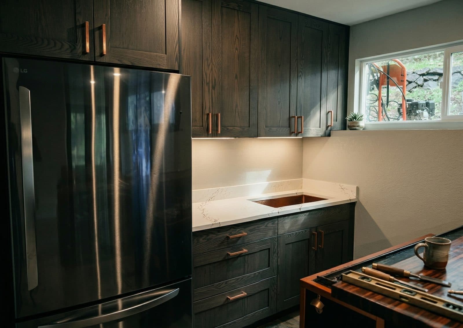 Dark Kitchen with Copper Accents