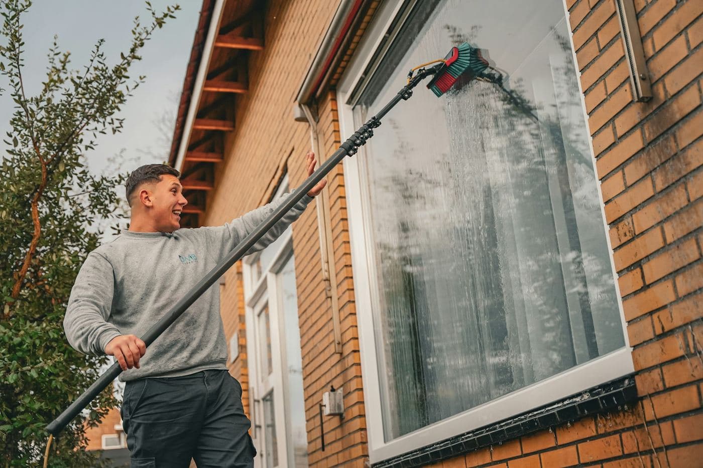 Exterior maintenance being carried out from the ground